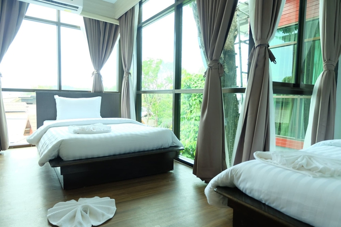 Imagen de la habitación del Hotel A Plus Deluxe. Foto 8