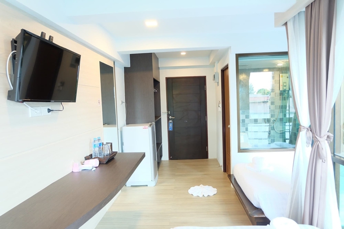 Imagen de la habitación del Hotel A Plus Deluxe. Foto 9