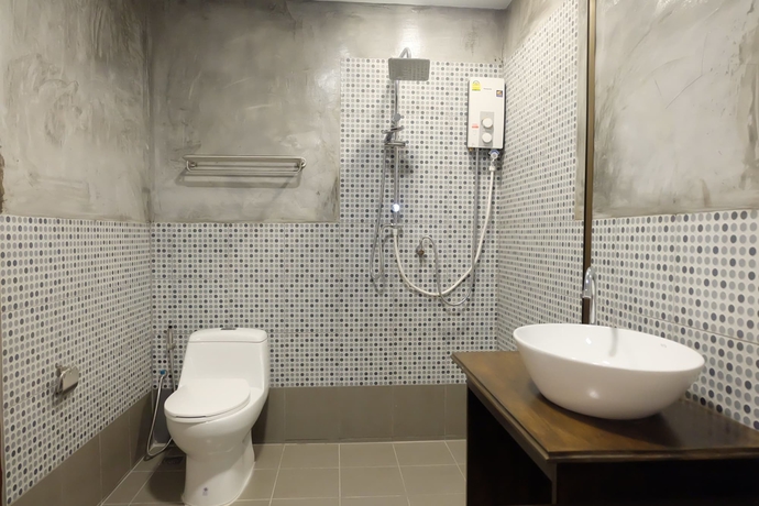 Imagen de la habitación del Hotel A Plus Deluxe. Foto 11