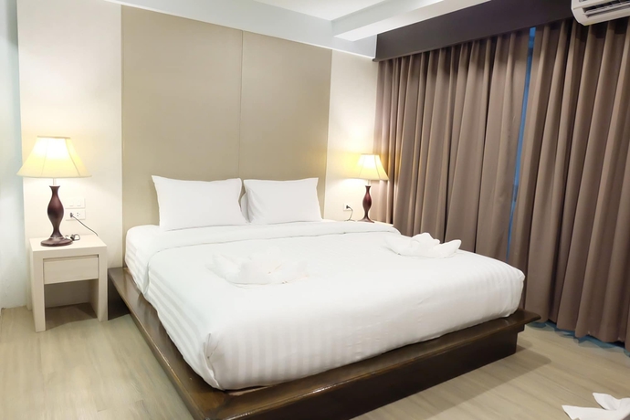 Imagen de la habitación del Hotel A Plus Deluxe. Foto 15