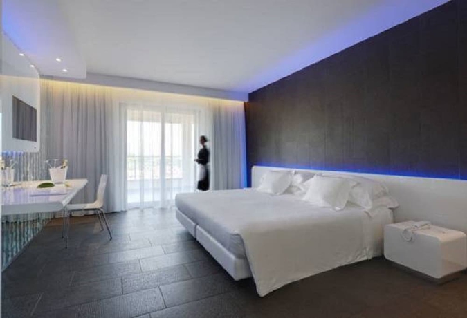 Imagen de la habitación del Hotel A Point Porto Ercole Resort and Spa. Foto 3