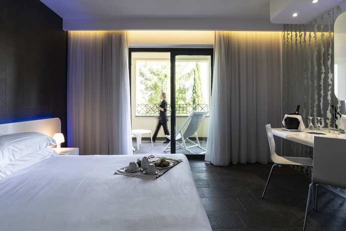 Imagen de la habitación del Hotel A Point Porto Ercole Resort and Spa. Foto 8