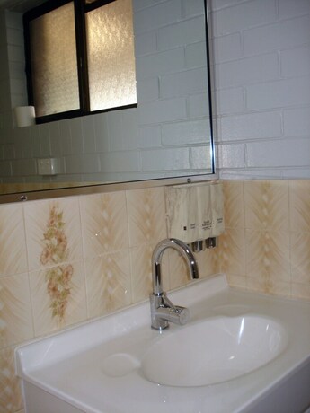 Imagen de la habitación del Hotel A Raceview Motor Inn. Foto 17