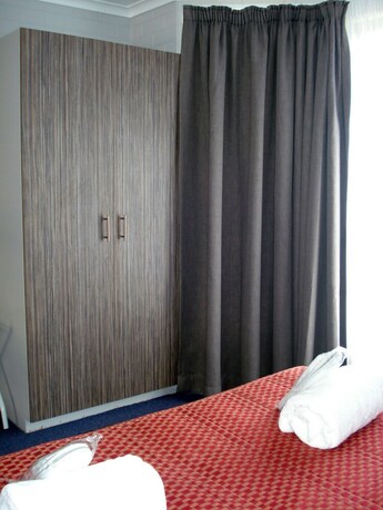 Imagen de la habitación del Hotel A Raceview Motor Inn. Foto 22