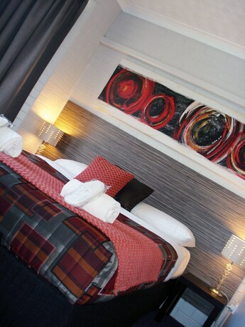 Imagen de la habitación del Hotel A Raceview Motor Inn. Foto 25