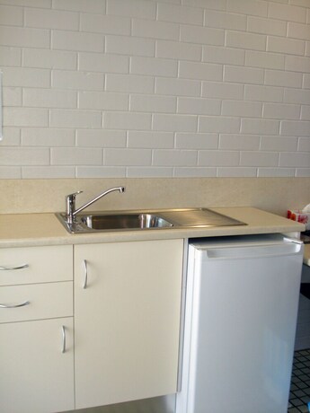 Imagen de la habitación del Hotel A Raceview Motor Inn. Foto 27