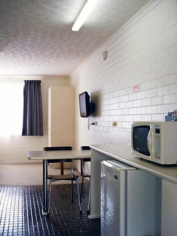 Imagen de la habitación del Hotel A Raceview Motor Inn. Foto 28