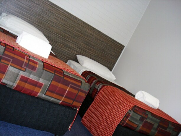 Imagen de la habitación del Hotel A Raceview Motor Inn. Foto 34