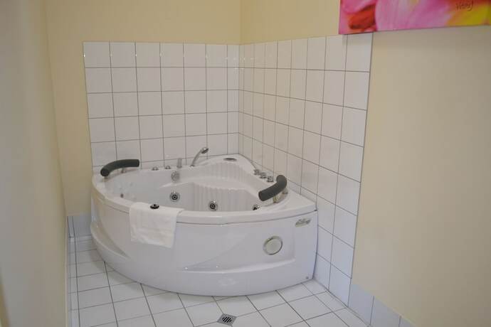 Imagen de la habitación del Hotel A Secret Garden. Foto 11