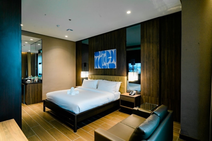 Imagen de la habitación del Hotel A and A Quezon City powered by Cocotel. Foto 2