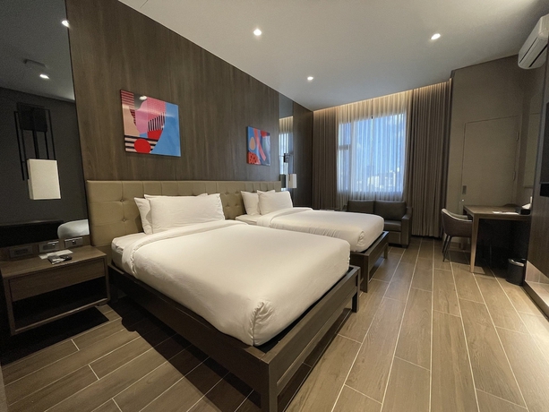 Imagen de la habitación del Hotel A and A Quezon City powered by Cocotel. Foto 6