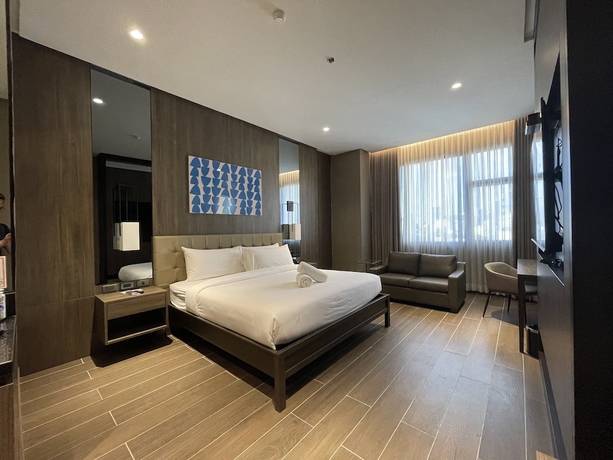 Imagen de la habitación del Hotel A and A Quezon City powered by Cocotel. Foto 7