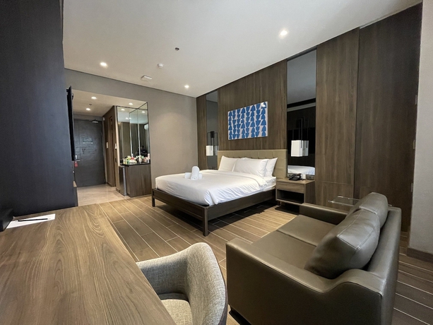 Imagen de la habitación del Hotel A and A Quezon City powered by Cocotel. Foto 8