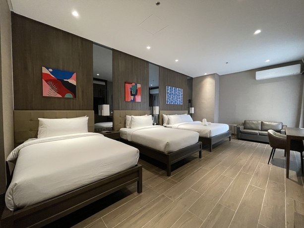 Imagen de la habitación del Hotel A and A Quezon City powered by Cocotel. Foto 10
