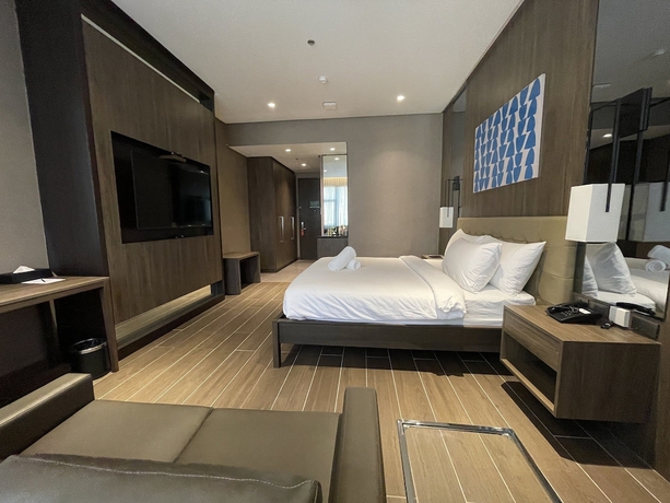 Imagen de la habitación del Hotel A and A Quezon City powered by Cocotel. Foto 12