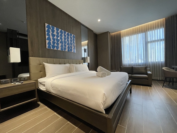 Imagen de la habitación del Hotel A and A Quezon City powered by Cocotel. Foto 13