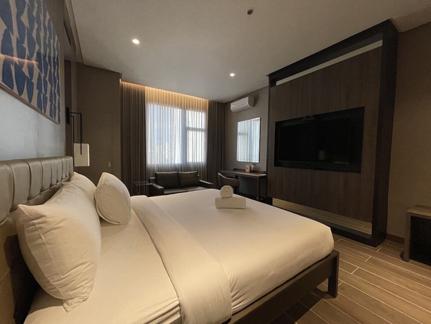 Imagen de la habitación del Hotel A and A Quezon City powered by Cocotel. Foto 14