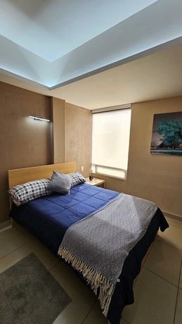 Imagen de la habitación del Hotel A08 SUPER CITY SUITES AT PLAZA ACEQUIA. Foto 10