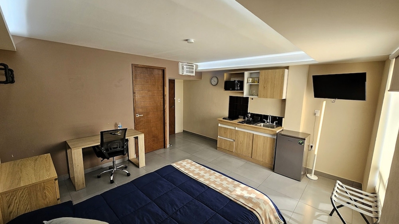 Imagen de la habitación del Hotel A08 SUPER CITY SUITES AT PLAZA ACEQUIA. Foto 12