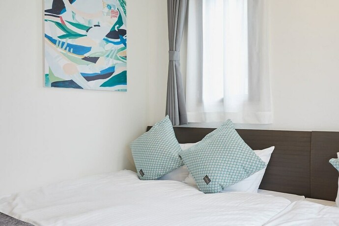 Imagen de la habitación del Hotel A1 Maison Phillippe Shitaya 101. Foto 28