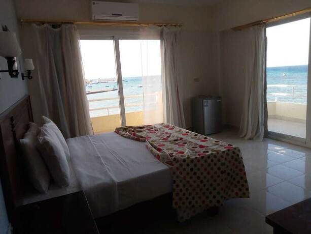 Imagen de la habitación del Hotel A1 Suites. Foto 18