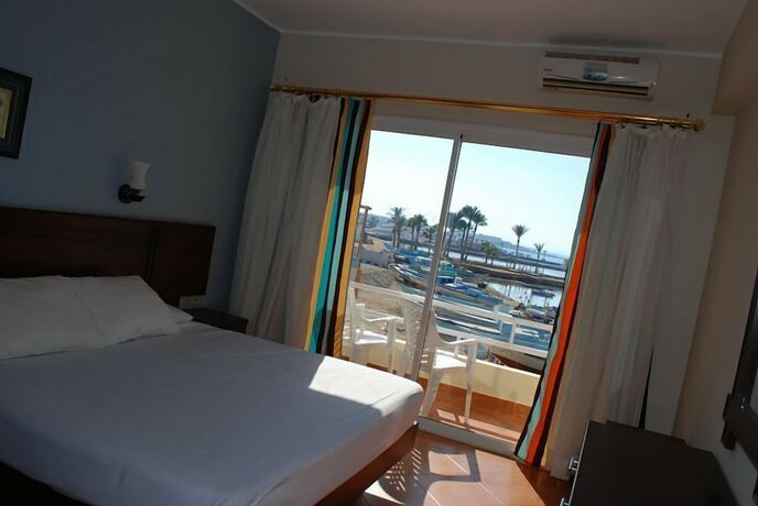 Imagen de la habitación del Hotel A1 Suites. Foto 19