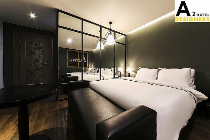 Imagen de la habitación del Hotel A2 Designers. Foto 10