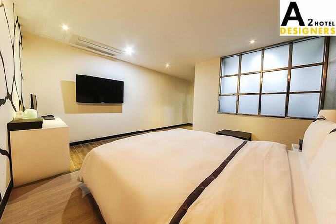 Imagen de la habitación del Hotel A2 Designers. Foto 11