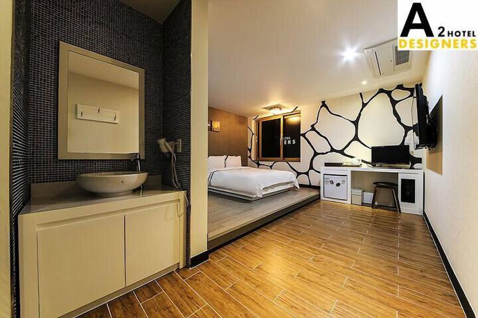 Imagen de la habitación del Hotel A2 Designers. Foto 17