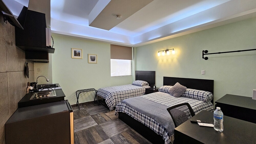 Imagen de la habitación del Hotel A21 Full Suite MiniDept at Plaza Acequia. Foto 11