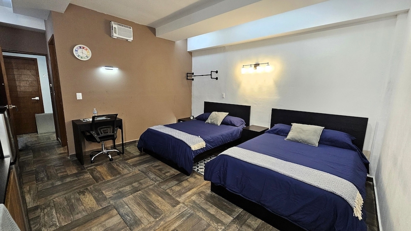 Imagen de la habitación del Hotel A21 Full Suite MiniDept at Plaza Acequia. Foto 13
