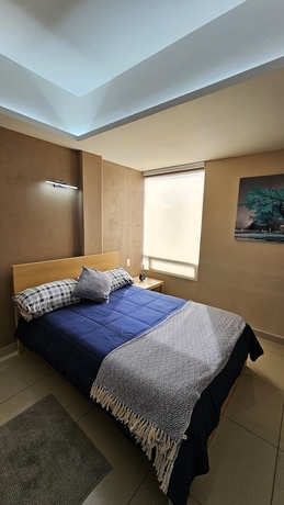 Imagen de la habitación del Hotel A25 Full Suite MiniDept at Plaza Acequia. Foto 7