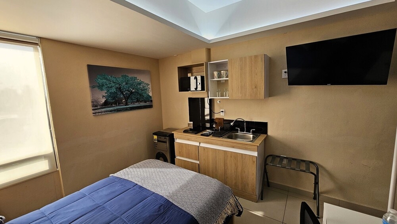 Imagen de la habitación del Hotel A25 Full Suite MiniDept at Plaza Acequia. Foto 11