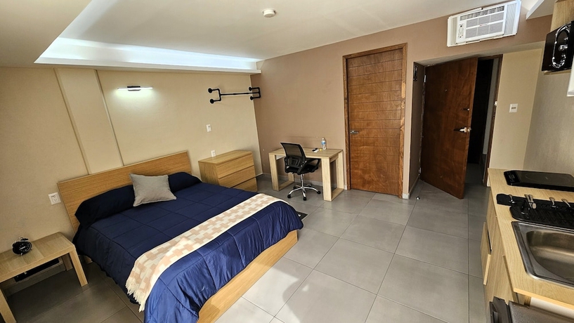 Imagen de la habitación del Hotel A25 Full Suite MiniDept at Plaza Acequia. Foto 14