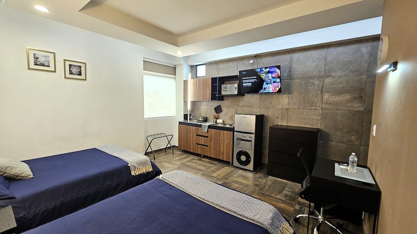 Imagen de la habitación del Hotel A27 Full Suite MiniDept at Plaza Acequia. Foto 2