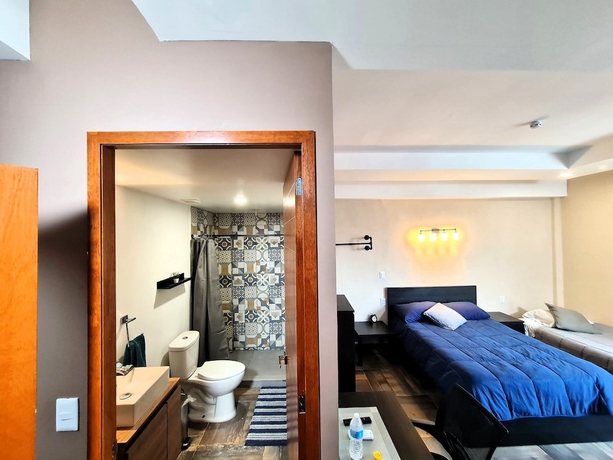 Imagen de la habitación del Hotel A27 Full Suite MiniDept at Plaza Acequia. Foto 4