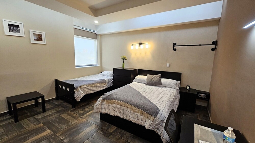 Imagen de la habitación del Hotel A27 Full Suite MiniDept at Plaza Acequia. Foto 11