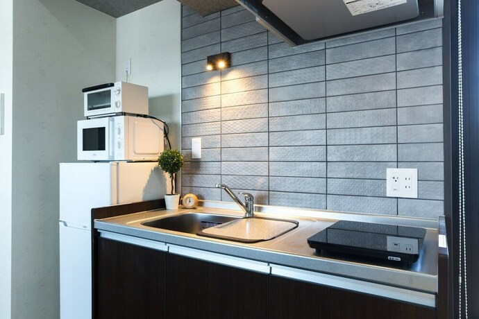 Imagen de la habitación del Hotel A9 Haneda Maison Philippe Omori 901. Foto 21