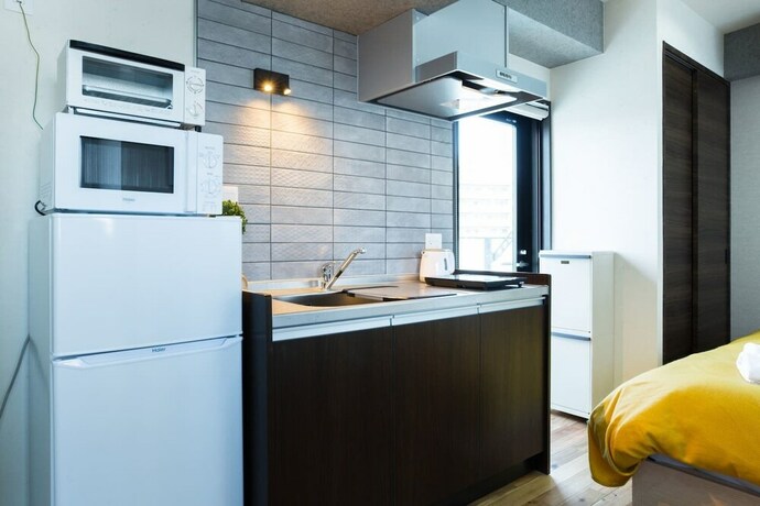 Imagen de la habitación del Hotel A9 Haneda Maison Philippe Omori 901. Foto 36