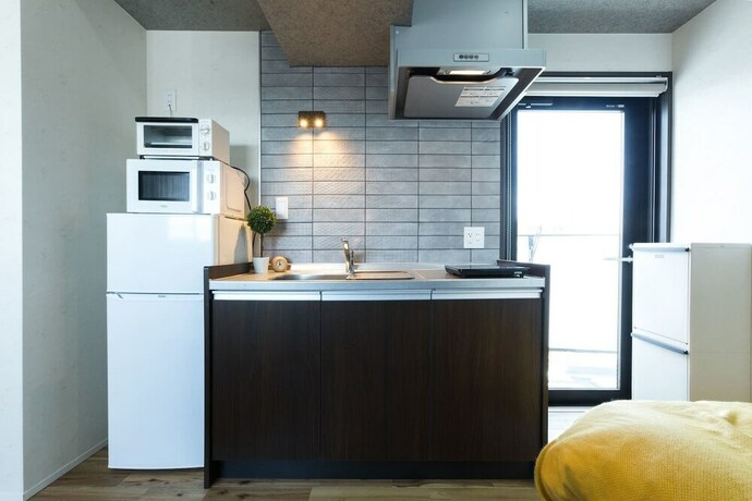 Imagen de la habitación del Hotel A9 Haneda Maison Philippe Omori 901. Foto 37