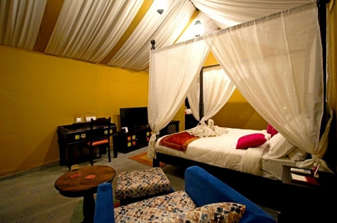 Imagen de la habitación del Hotel AARYA CLUB AND RESORTS. Foto 12