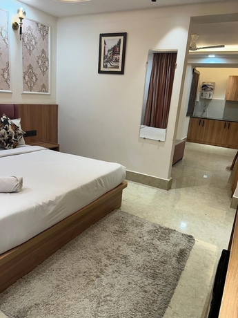 Imagen de la habitación del Hotel AATITHYAM RESIDENCY. Foto 2
