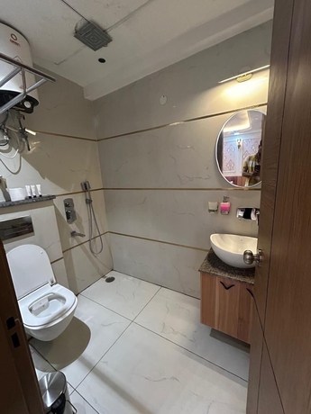Imagen de la habitación del Hotel AATITHYAM RESIDENCY. Foto 5