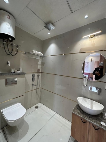 Imagen de la habitación del Hotel AATITHYAM RESIDENCY. Foto 10
