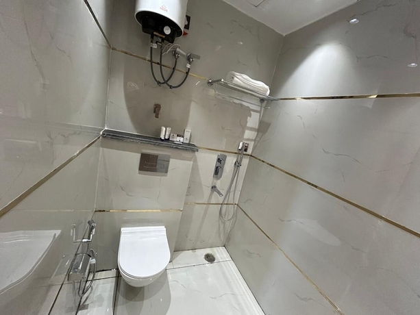 Imagen de la habitación del Hotel AATITHYAM RESIDENCY. Foto 11
