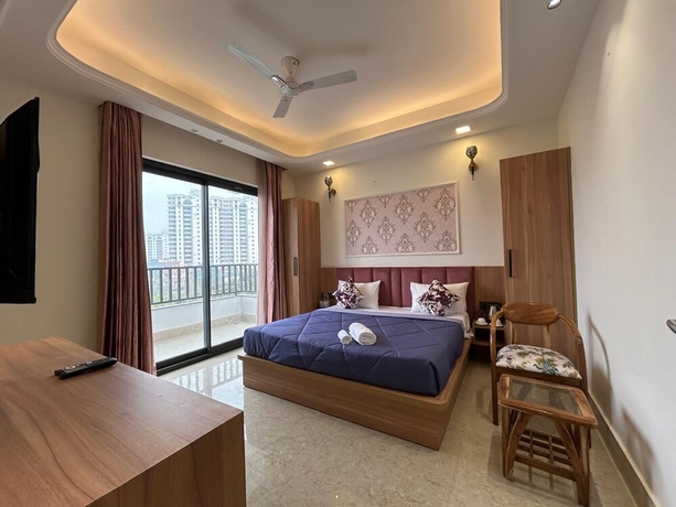 Imagen de la habitación del Hotel AATITHYAM RESIDENCY. Foto 12