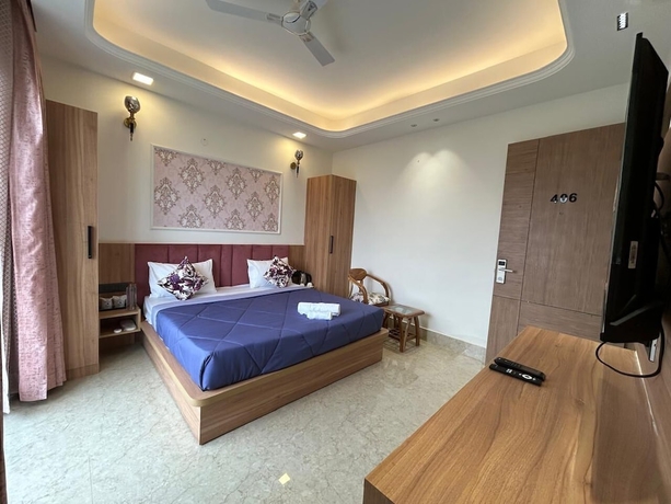 Imagen de la habitación del Hotel AATITHYAM RESIDENCY. Foto 13