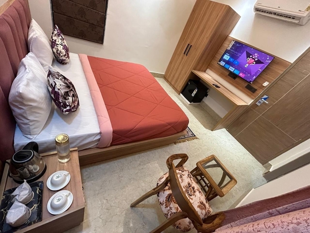 Imagen de la habitación del Hotel AATITHYAM RESIDENCY. Foto 15