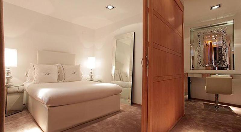 Imagen de la habitación del Hotel AB Design Suites. Foto 17