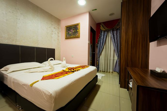 Imagen de la habitación del Hotel AB Inn. Foto 11